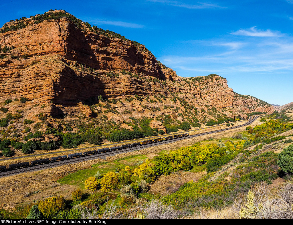 UP 6066 leads eastbound tank train up-grade at Echo Canyon